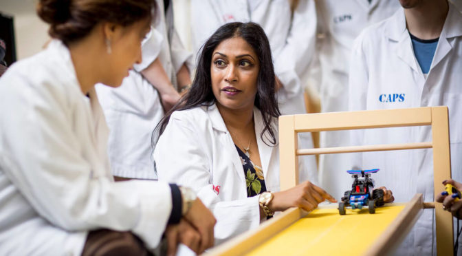 Dr Parappilly with physics Lego race car